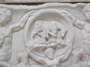 Clipeus: Romulus and Remus suckling the she-wolf
