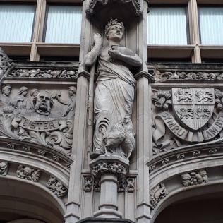 Asclepius with his cocks, Queen's Building, Cardiff University
